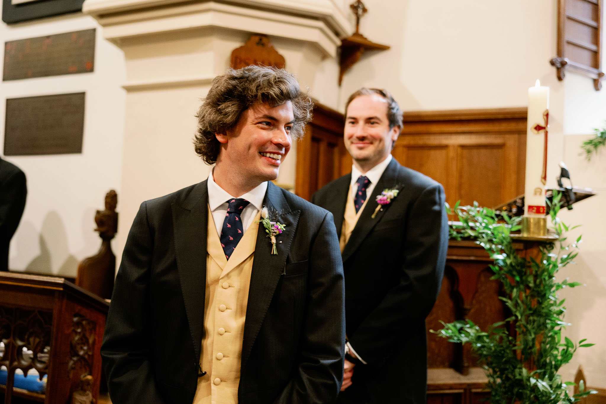 Groom sees bride for first time at a church wedding 