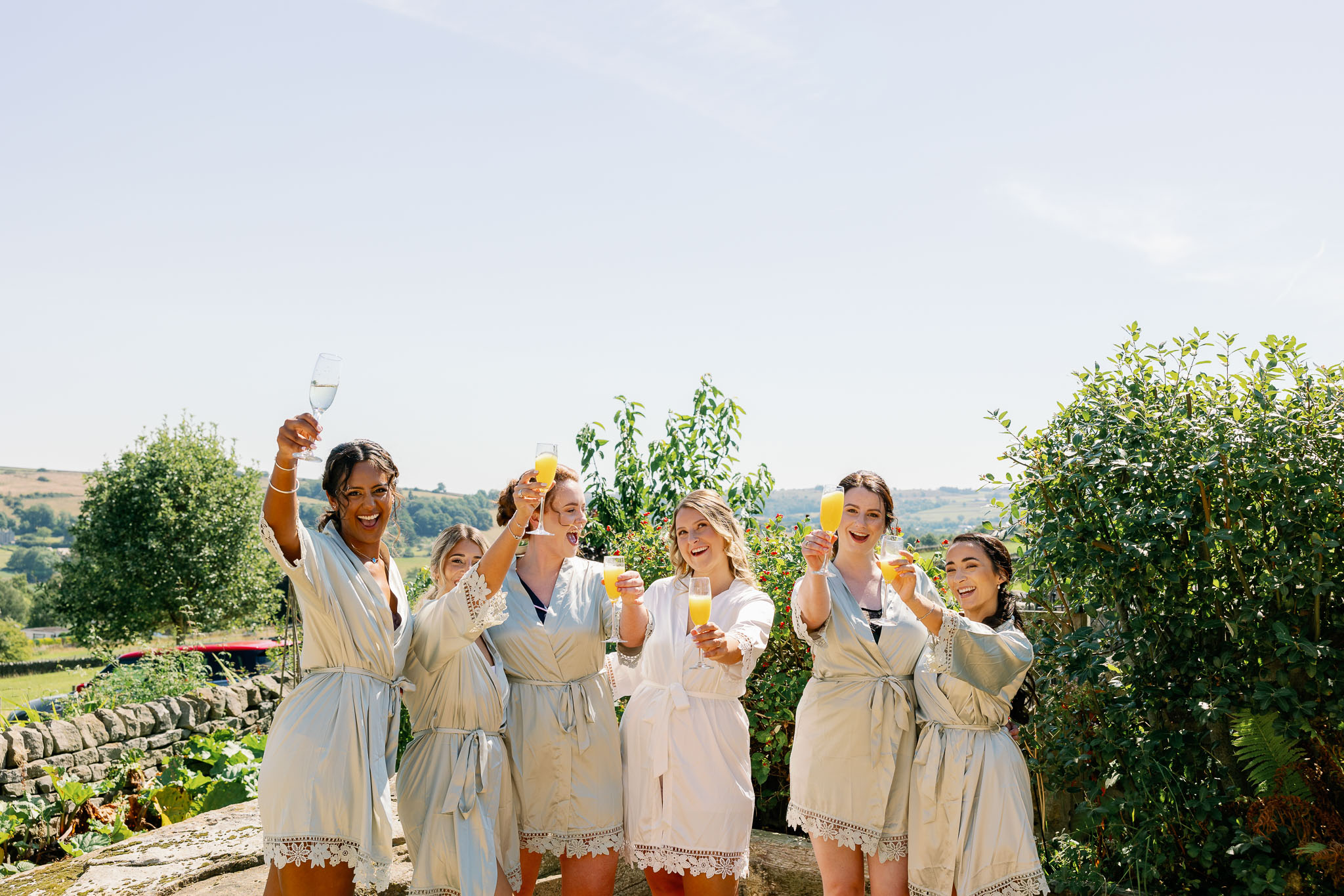 Bridemaids and bride on wedding morning 