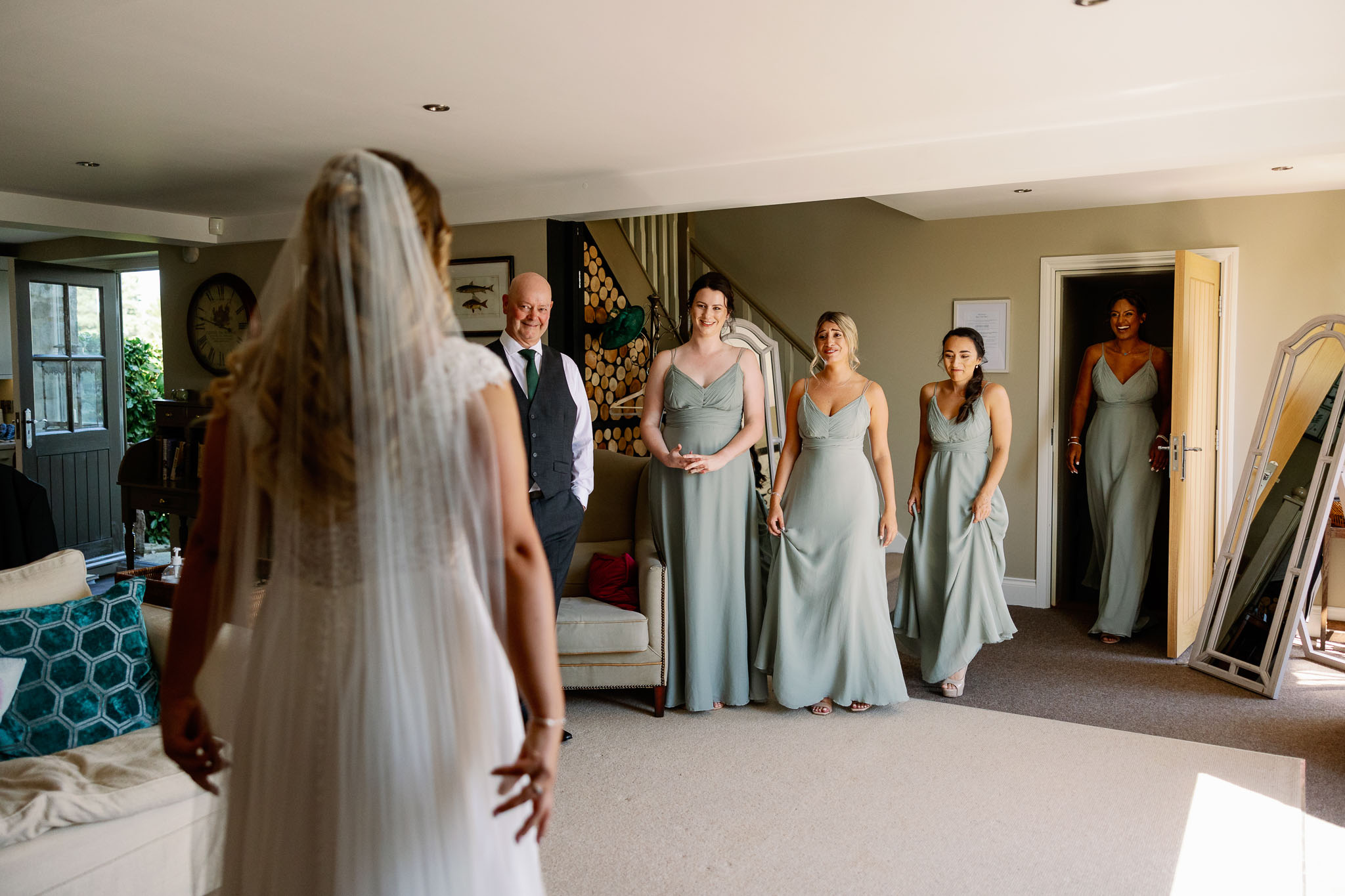 Bridesmaids see bride for the first time 