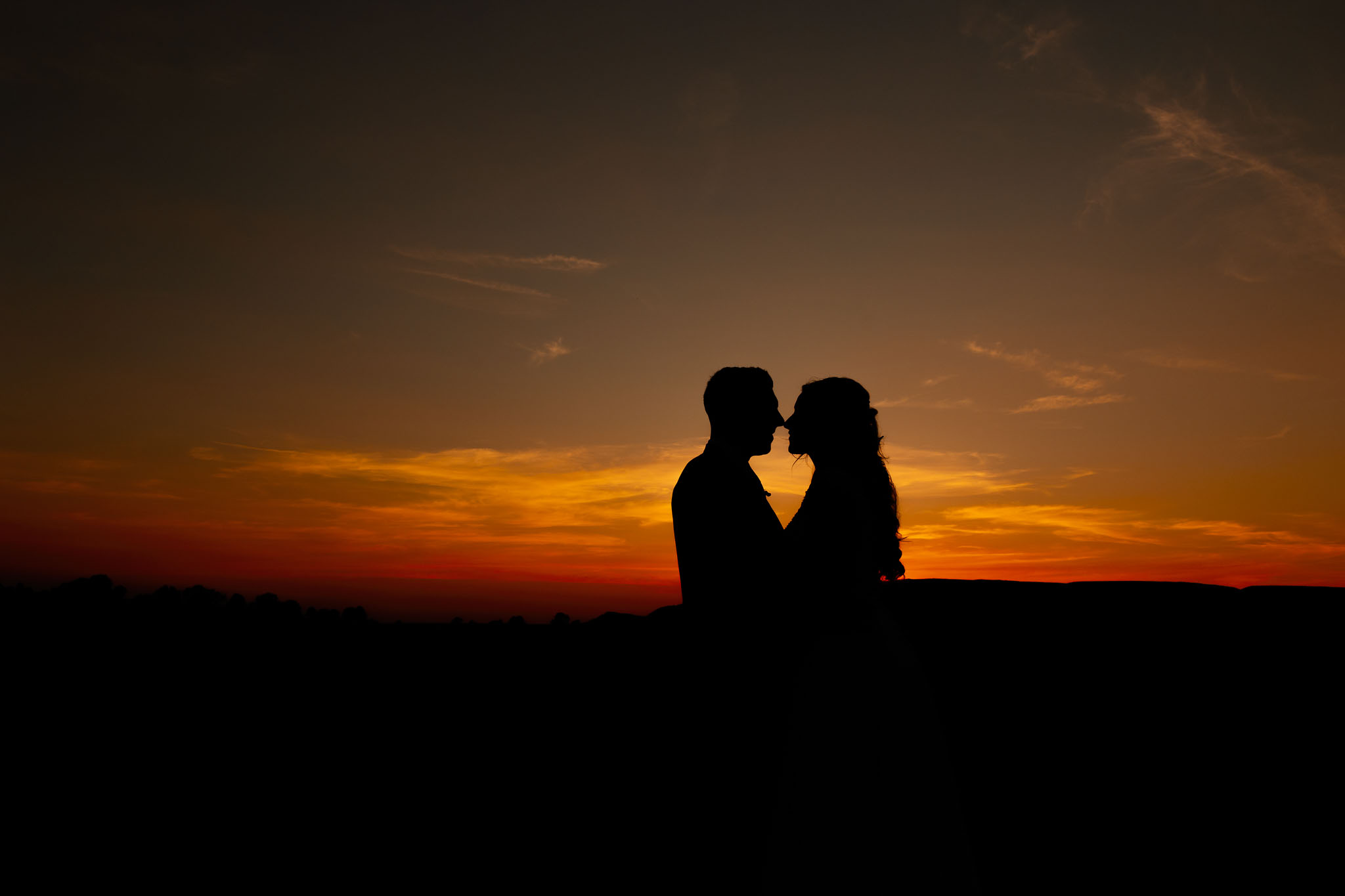 Sunset Pictures of a bride and groom at The Tithe Barn Bolton Abbey