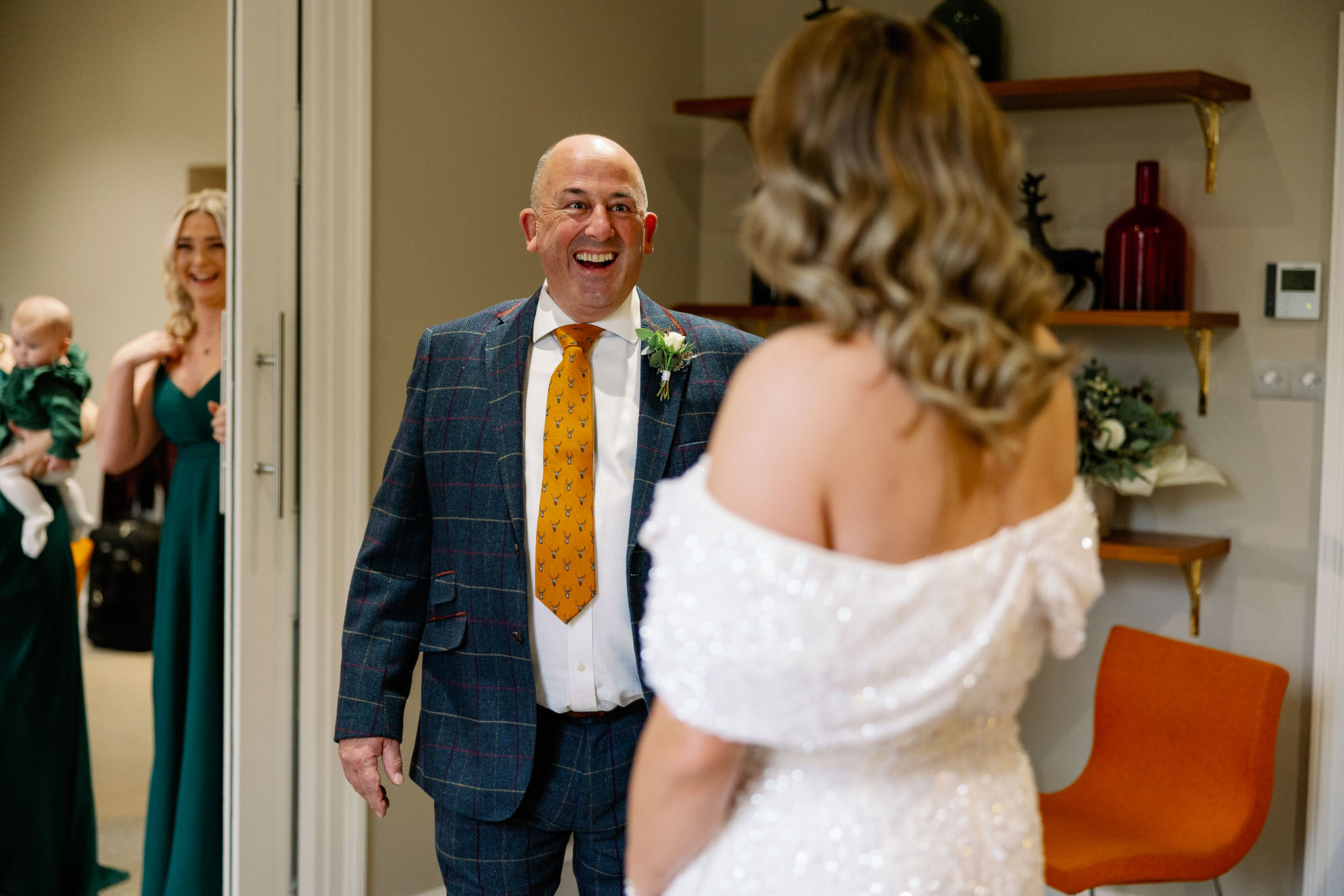 Happy Dad seeing his daughter for the first time in her Asos Wedding Dress 